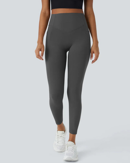 Leggings Modeladoras de Cintura Subida com Bolsos Laterais Controlo da Barriga e Aumento das Nádegas
