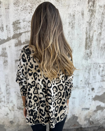 Blusa Elástica para Mulher com Estampado Animal e Decote Redondo